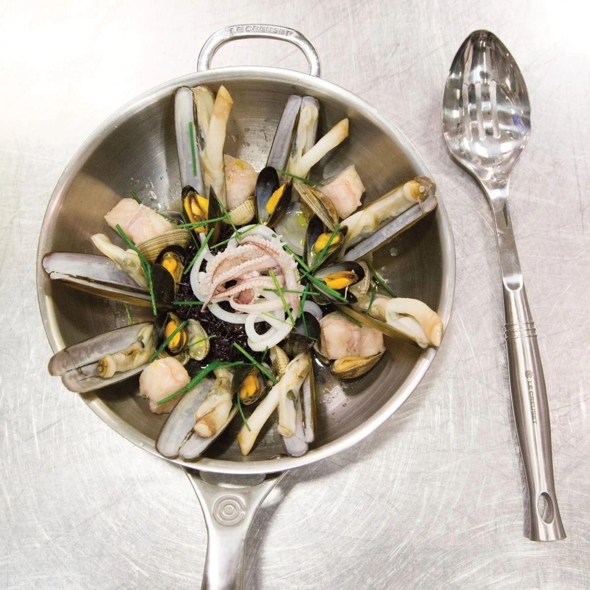 Le Creuset 3.5 Qt. Tri-Ply Stainless Steel Saucier Pan With Lid & Helper Handle - Image 3